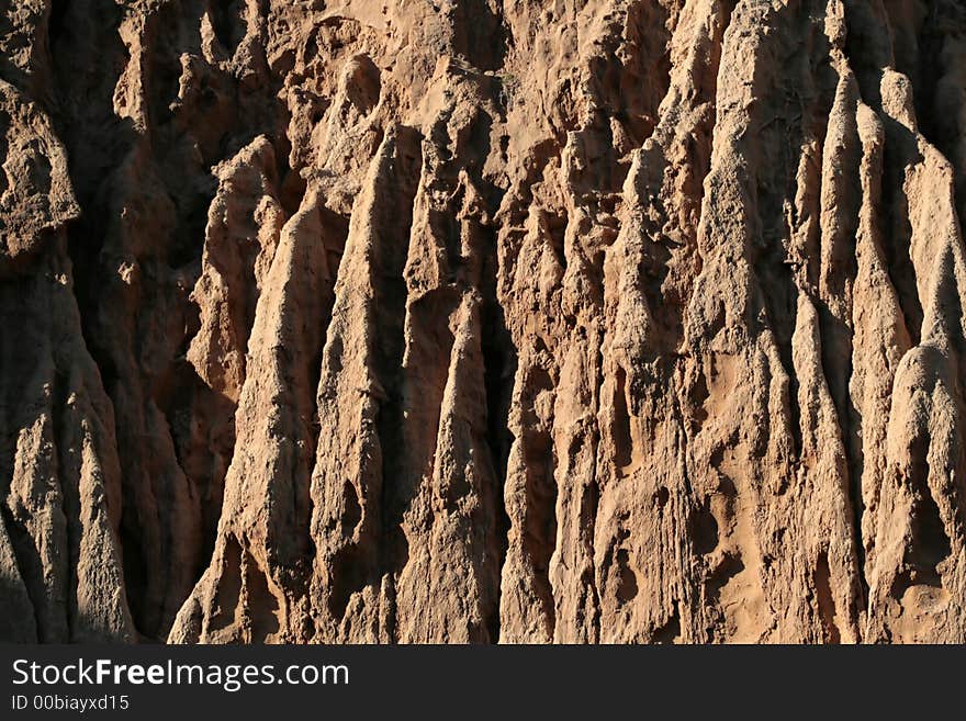 Orange colored dirt cliffs in California. Orange colored dirt cliffs in California