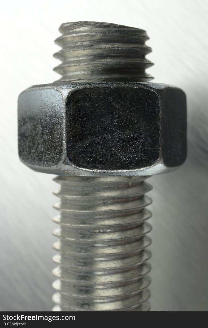 Closeup image of a nut and bolt.