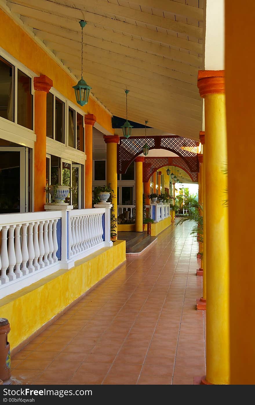 Yellow Pillars and white Railing in Hallway. Yellow Pillars and white Railing in Hallway