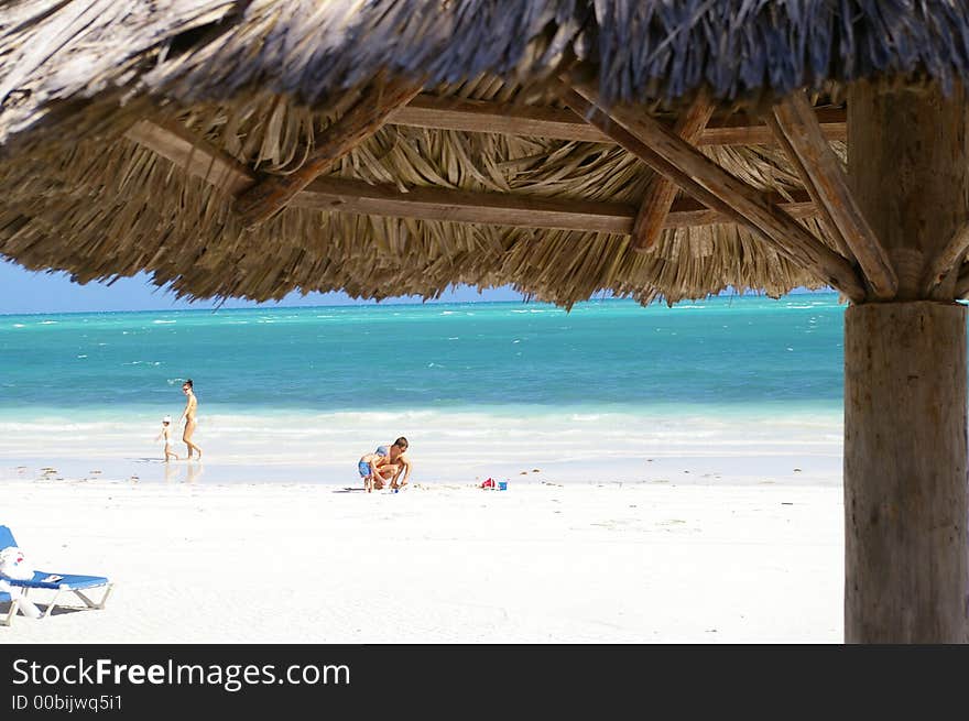 Palapa viewscape of the Carribean Sea and sand beach. Palapa viewscape of the Carribean Sea and sand beach