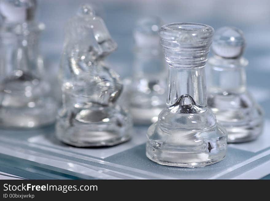 Figures of a glass chess game