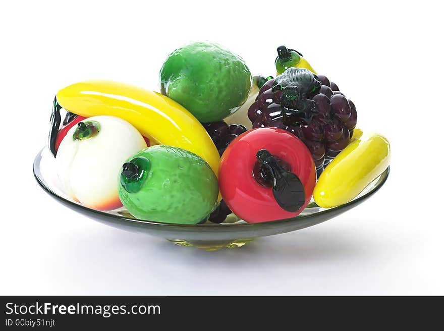 Plate full of glass fruit and veg. Plate full of glass fruit and veg