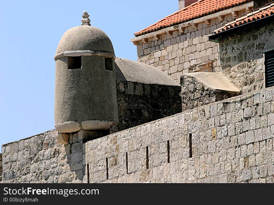 Outer Fortress stone wall with red roof. Outer Fortress stone wall with red roof