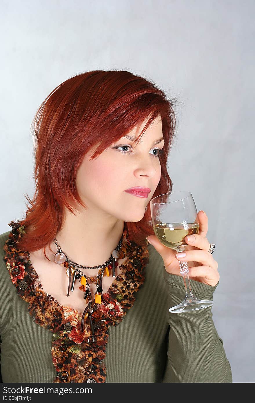 Woman With A Glass Of Wine