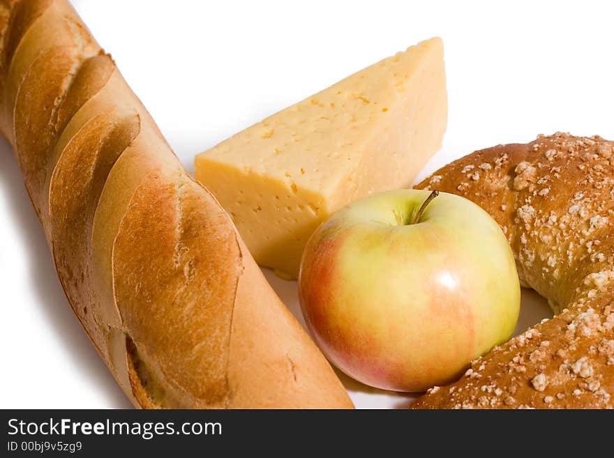 Breakfast - bread, cheese and apple, with copy space, on white background. Breakfast - bread, cheese and apple, with copy space, on white background.