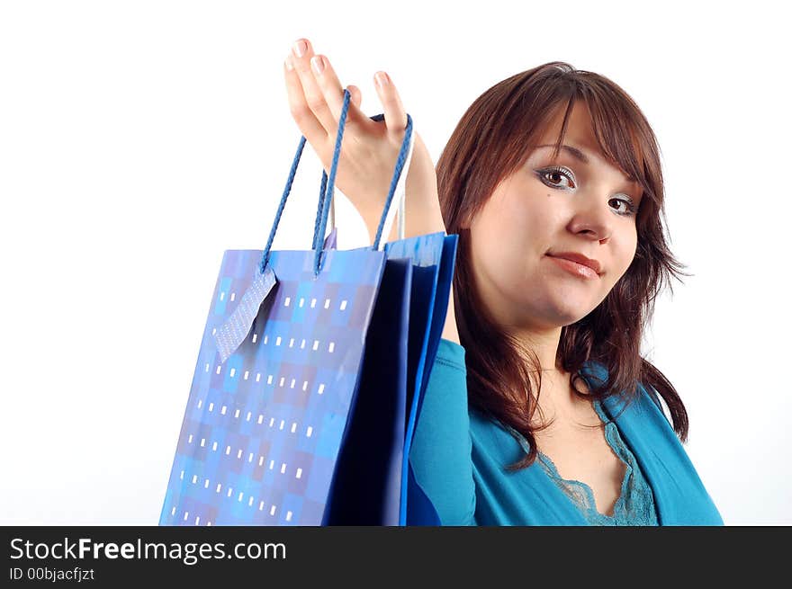 Attractive woman with shopping bags on white background. Attractive woman with shopping bags on white background