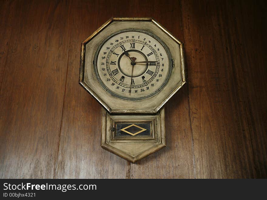 Antique clock with a calendar function. Antique clock with a calendar function.