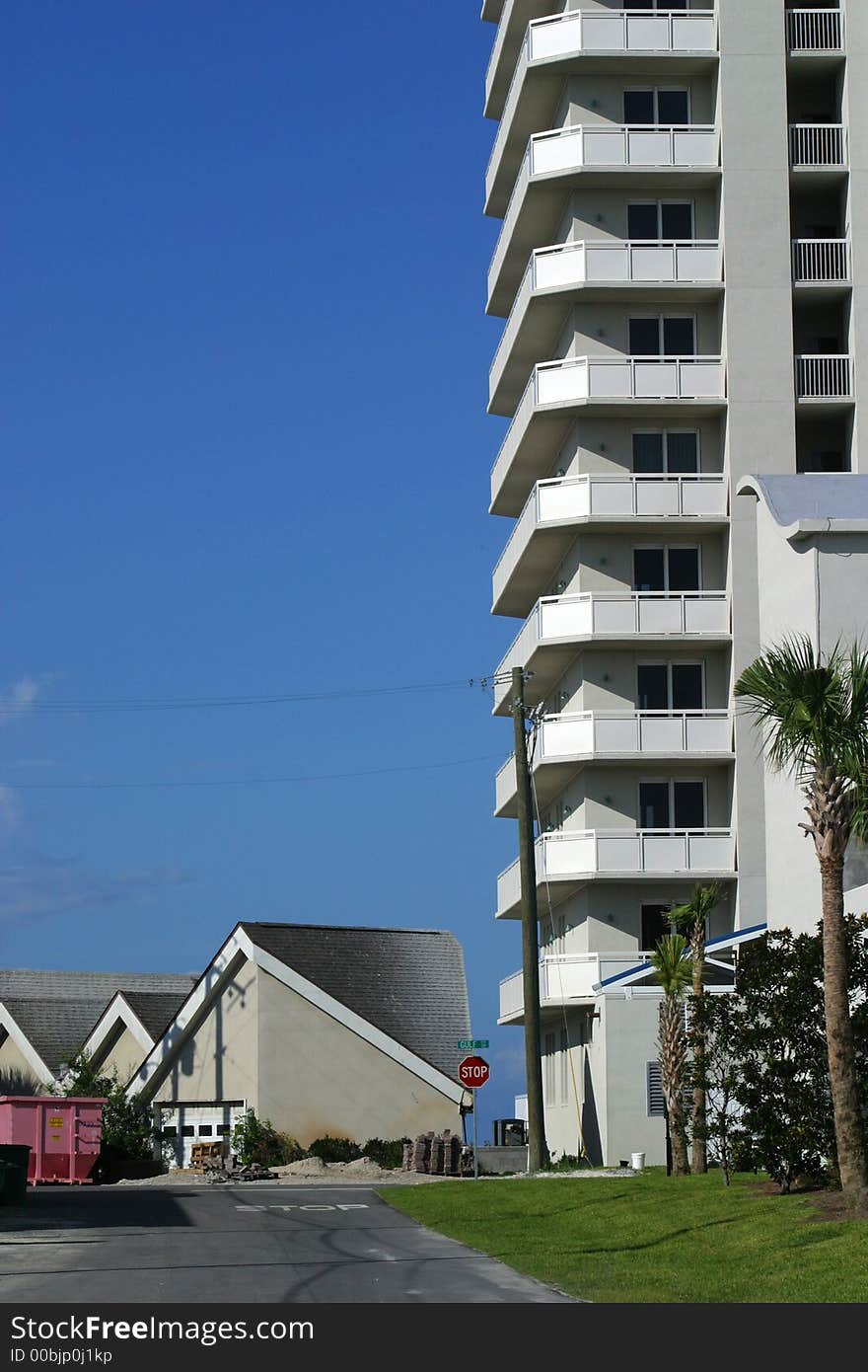 A new highrise condo inching closer to single family housing. A new highrise condo inching closer to single family housing