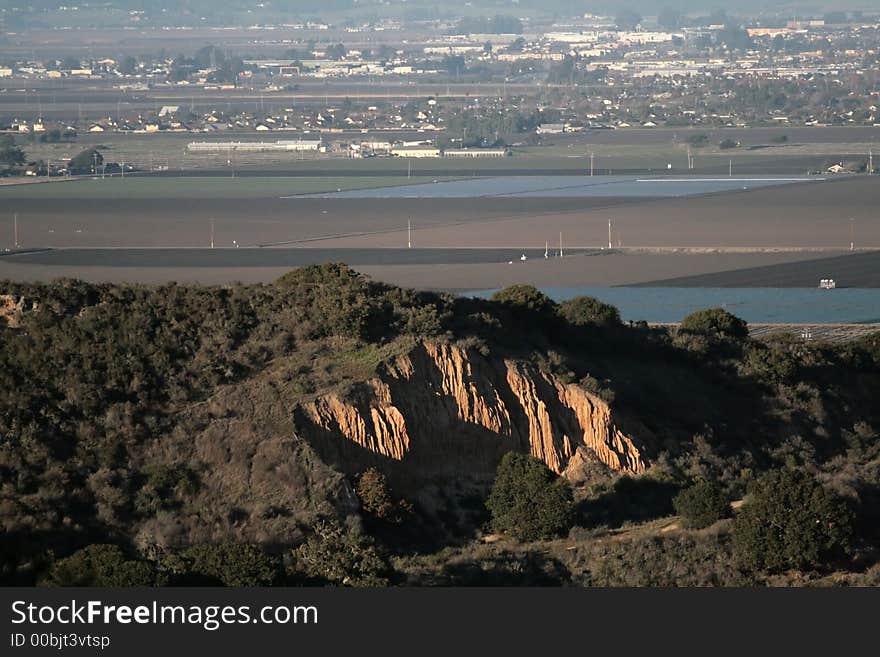 Orange colored dirt cliffs in California. Orange colored dirt cliffs in California