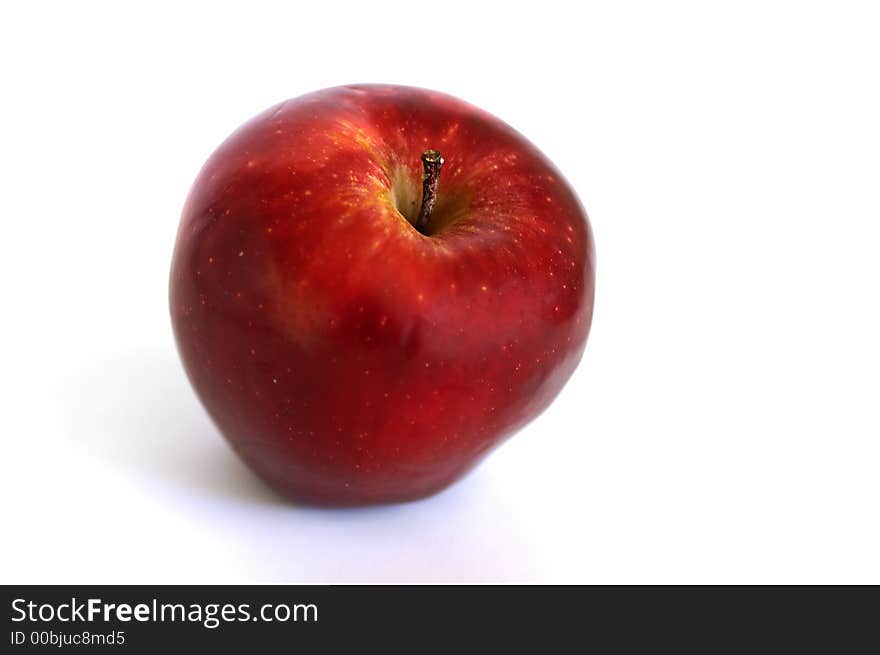 An apple isolated against a white background