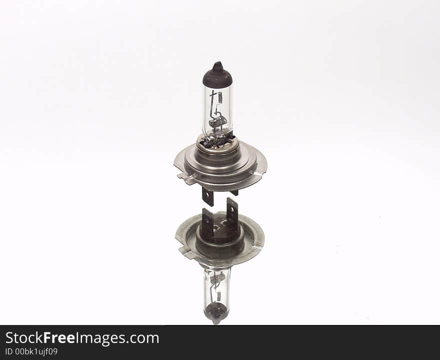 Closeup of a car  lightbulb on white background