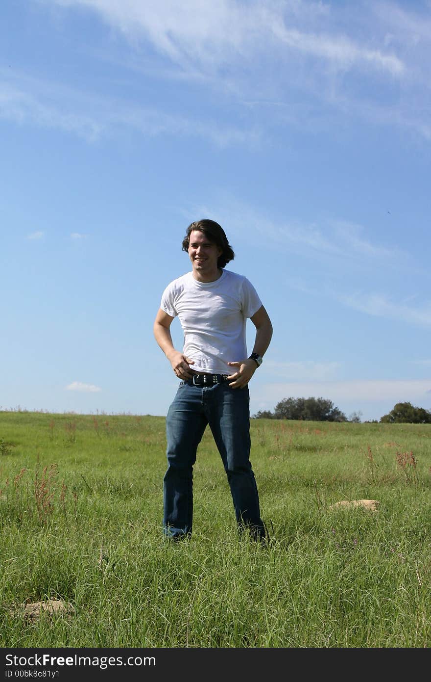 Photo of a young man standing in a field

~Happy Hill Road~. Photo of a young man standing in a field

~Happy Hill Road~