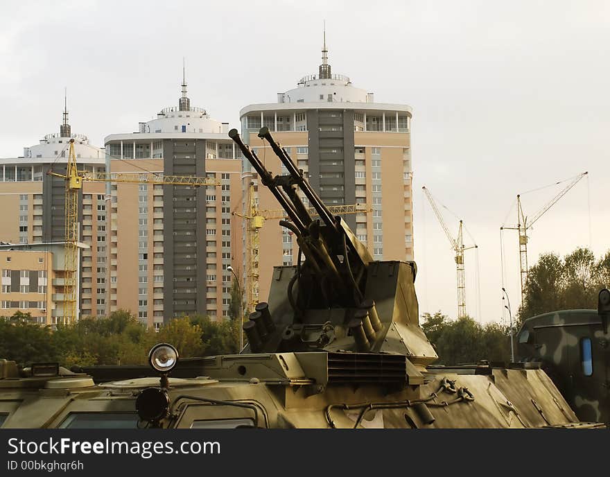 Gun of military vehicle against buildings in Kiev. Gun of military vehicle against buildings in Kiev