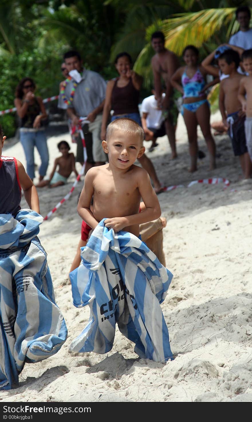 Boy at a bag race on a beach