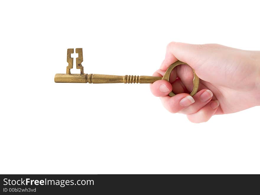 A hand turning a key against a white background. A hand turning a key against a white background.