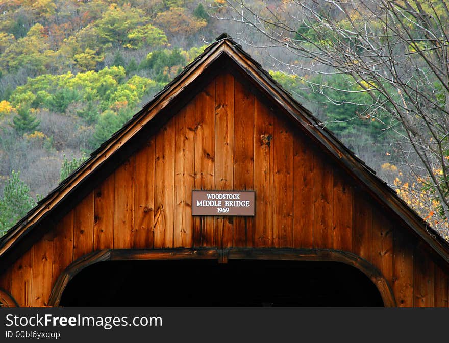 This covered bridge caught our attention while on a motorcycle trip through the northeast. This bridge is in Woodstock Vermont. Neslted in a valley, the surrounding mountains provide a beautiful fall foliage backdrop. This covered bridge caught our attention while on a motorcycle trip through the northeast. This bridge is in Woodstock Vermont. Neslted in a valley, the surrounding mountains provide a beautiful fall foliage backdrop.