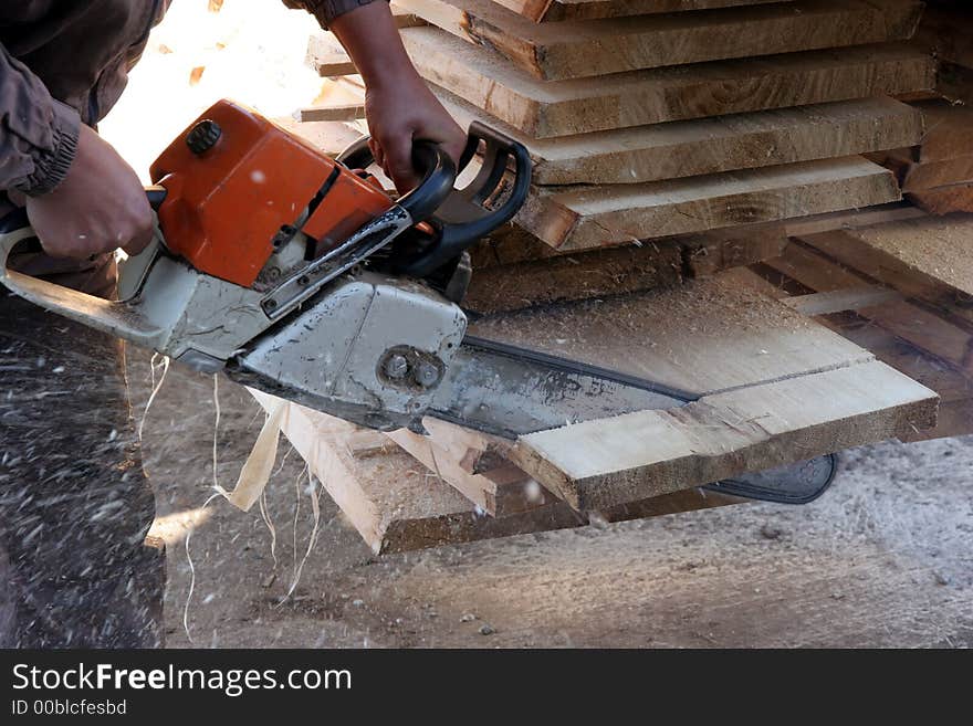 Cutting with chainsaw