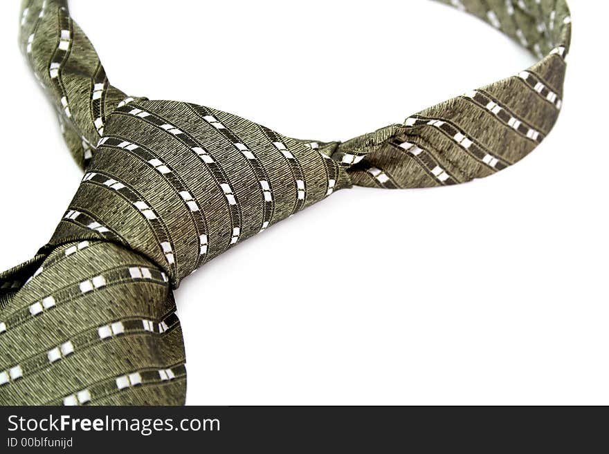 Tie with a simple pattern - a personal accessory of the businessman, isolated on white, (look similar images in my portfolio)