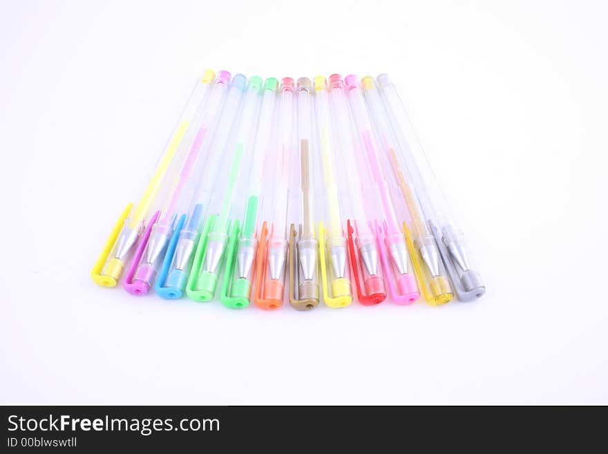 Color pens arranged in an arc-shape. Color pens arranged in an arc-shape