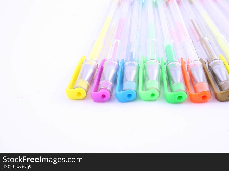 Color pens arranged in an arc-shape. Color pens arranged in an arc-shape