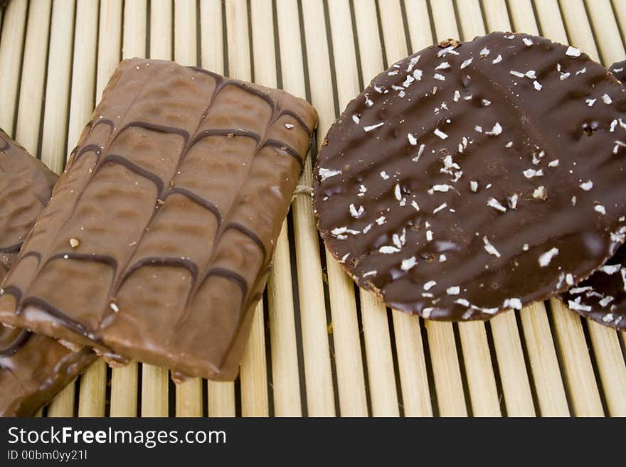 Chocolate candy on bamboo sheet. Chocolate candy on bamboo sheet.