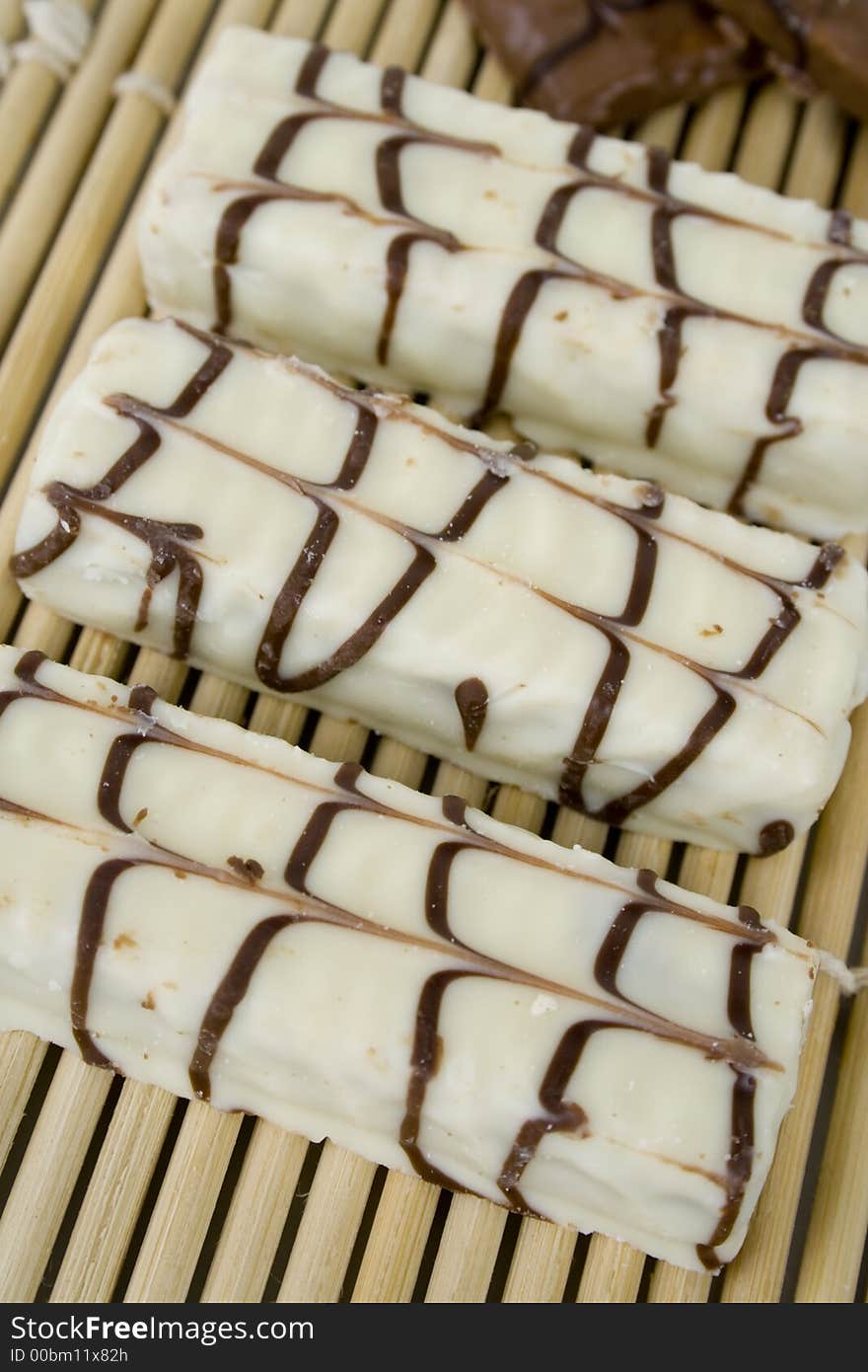 White chocolate cookies on bamboo sheet. White chocolate cookies on bamboo sheet.