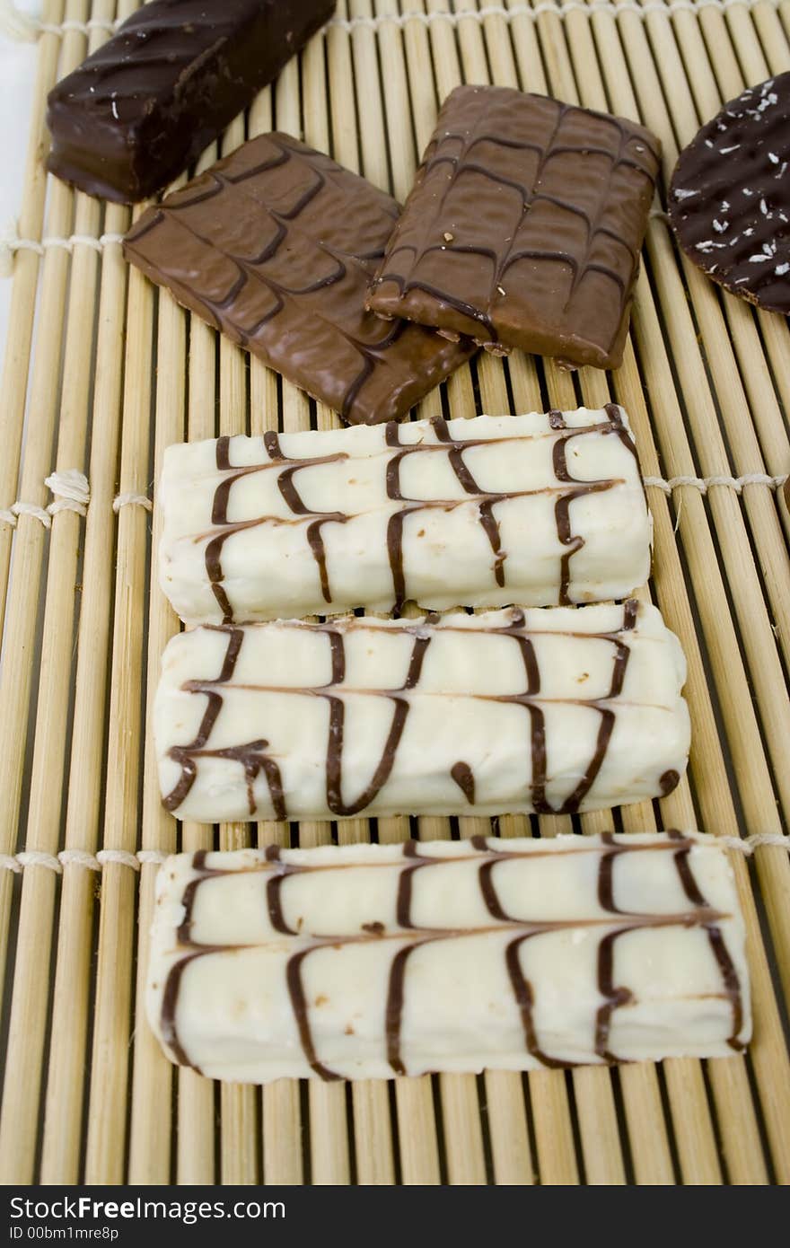 White chocolate cookies on bamboo sheet. White chocolate cookies on bamboo sheet.