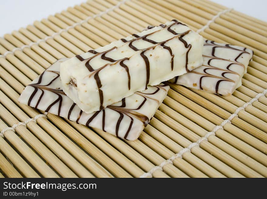 White chocolate cookies on bamboo sheet. White chocolate cookies on bamboo sheet.