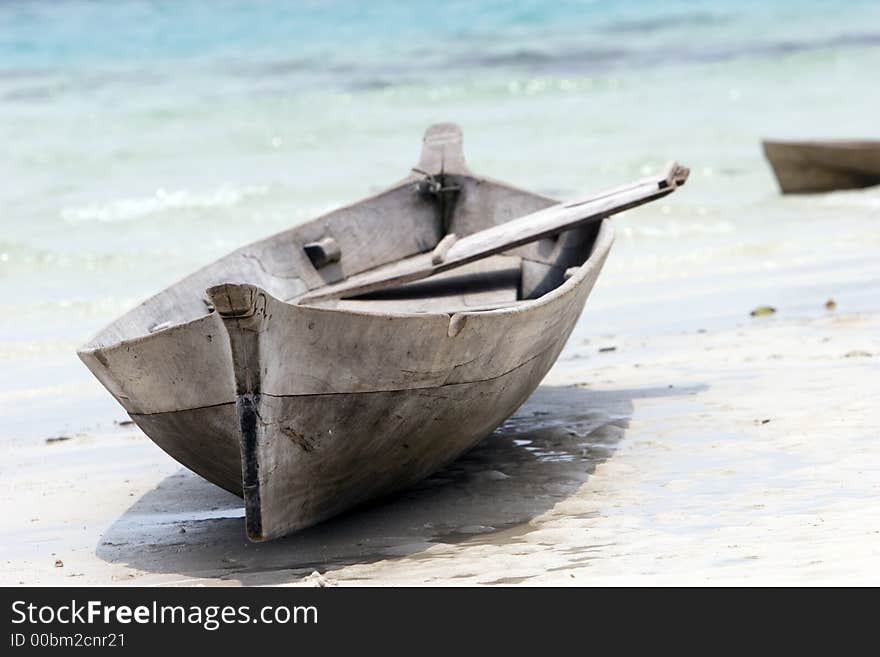 Canoe on tropical beach