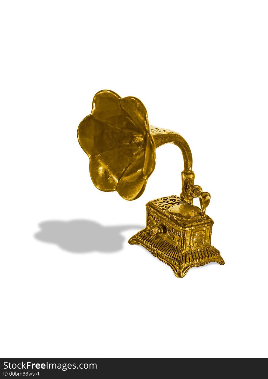 Gold old gramophone (figurine), isolated on white