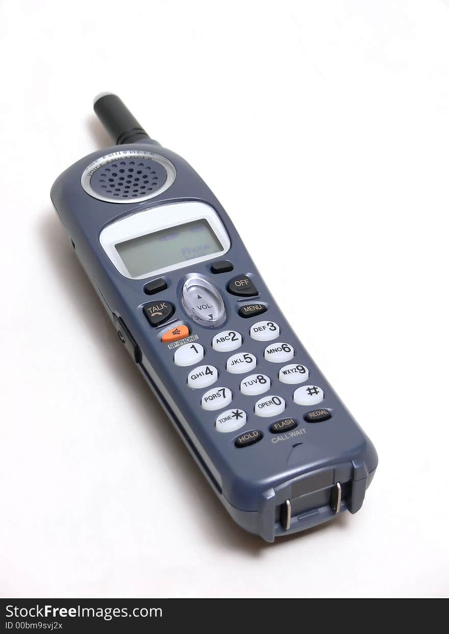 A cordless phone  in dark gray over white background. A cordless phone  in dark gray over white background.