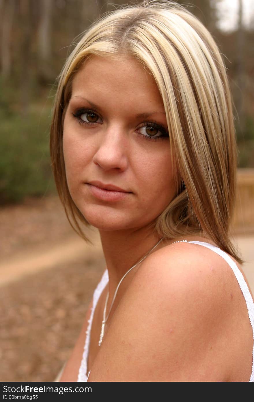 Young beautiful woman wearing a tank top. Young beautiful woman wearing a tank top