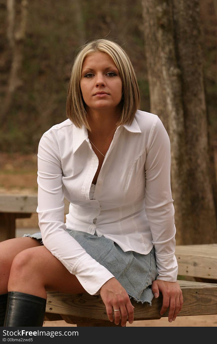 Young beautiful woman wearing a white dress shirt. Young beautiful woman wearing a white dress shirt