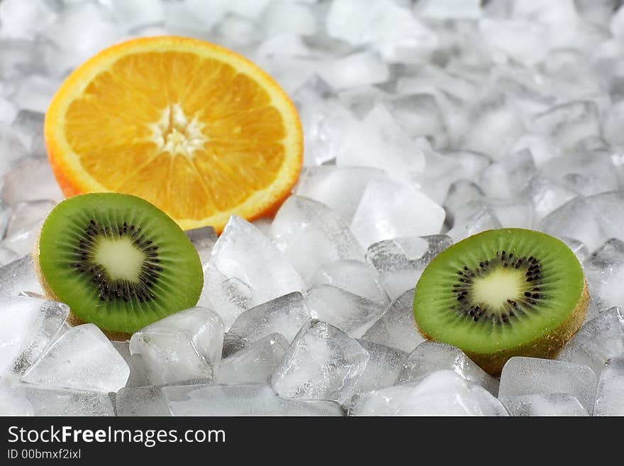 Orange and kiwi on ice