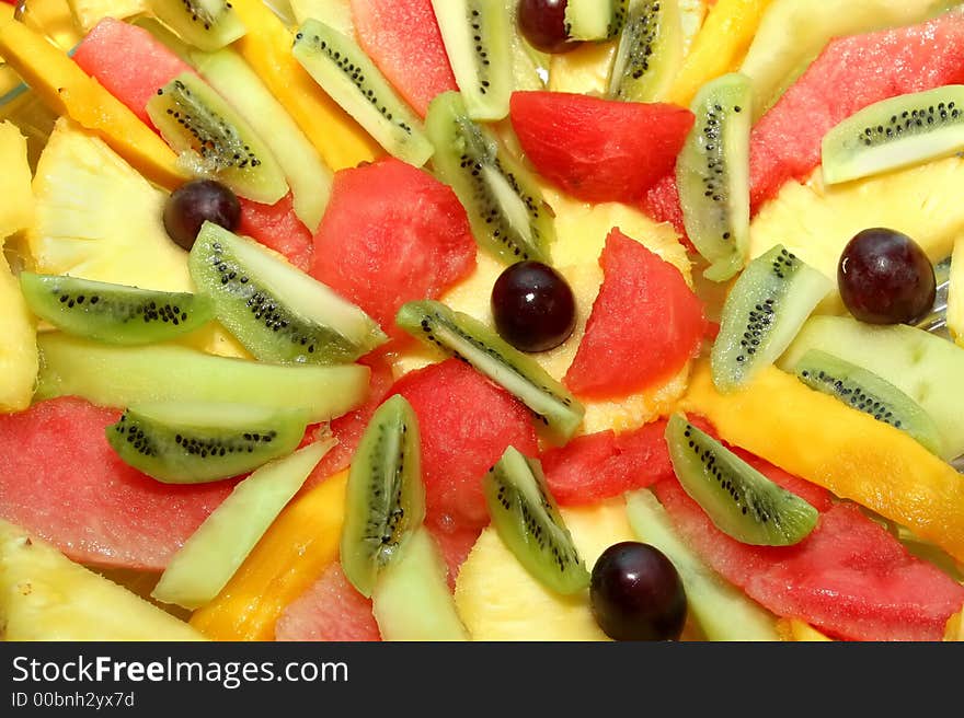 Several sliced pieces of fruit for background. Several sliced pieces of fruit for background