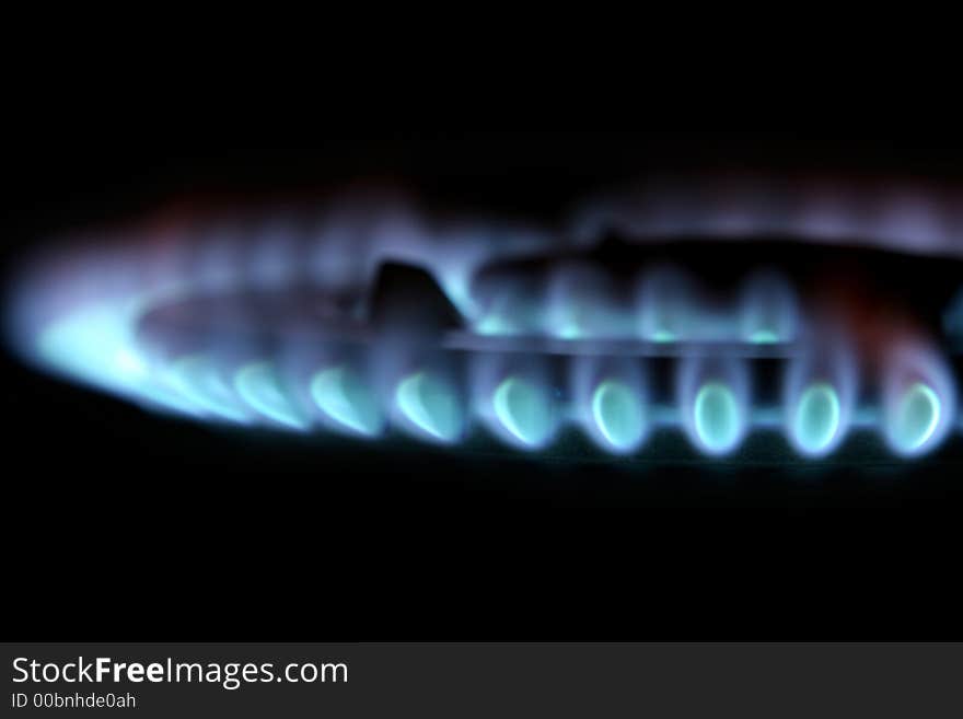 Flames from a stove isolated over black. Flames from a stove isolated over black