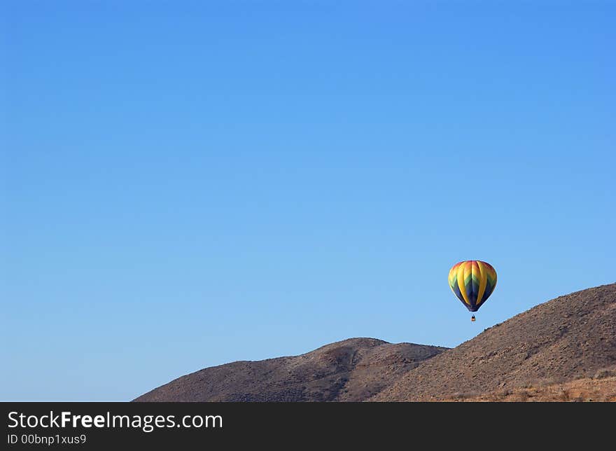 A hot air ballon and blue sky