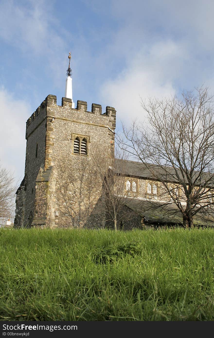 Grassy bank and church