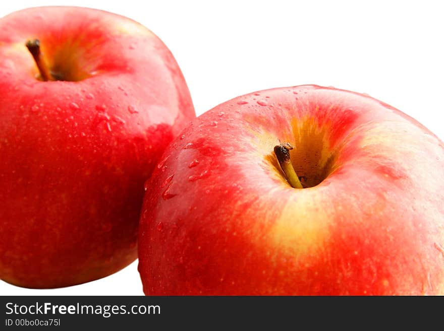 Two red apples on a white background. Two red apples on a white background.