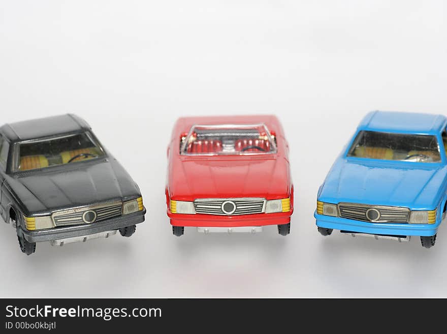 Three Classic Mercedes toy cars front