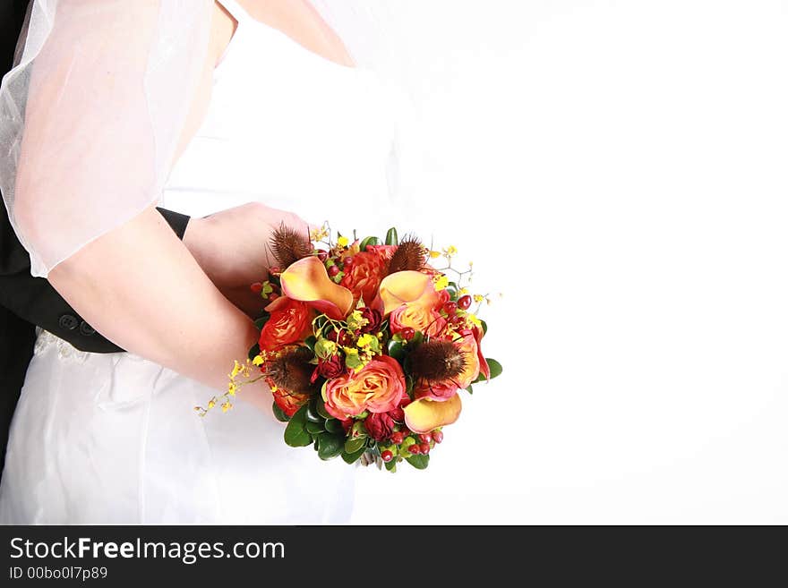 A loving embrace of a bride and groom