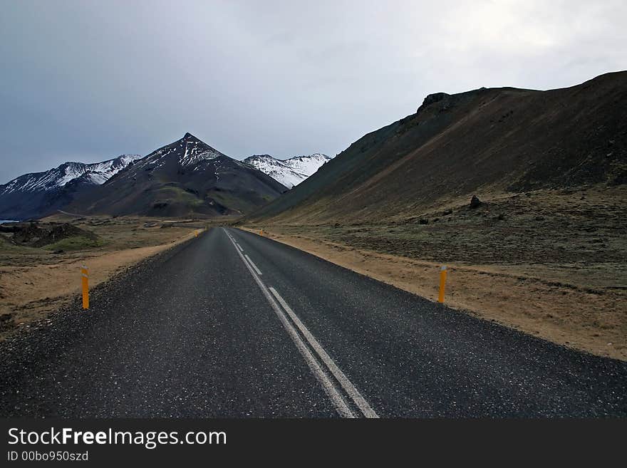 Deserted road leading into the horizon. Deserted road leading into the horizon