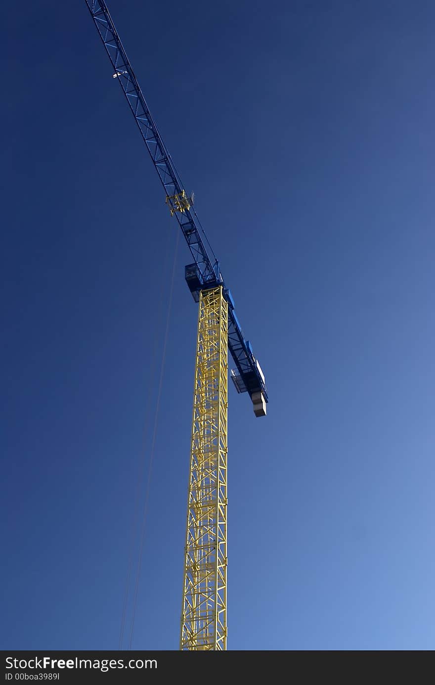 Crane on blue