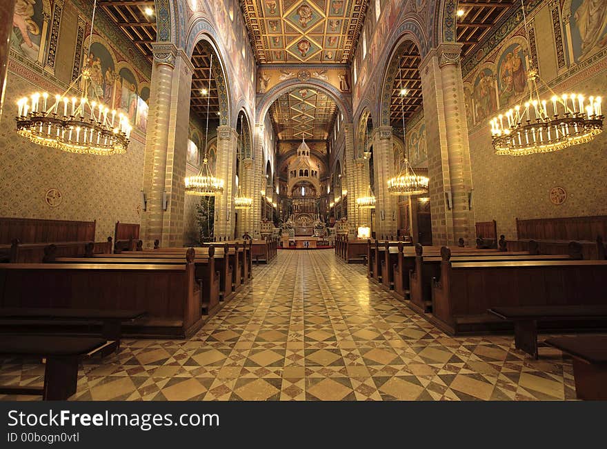 Church interior with arch and pillars