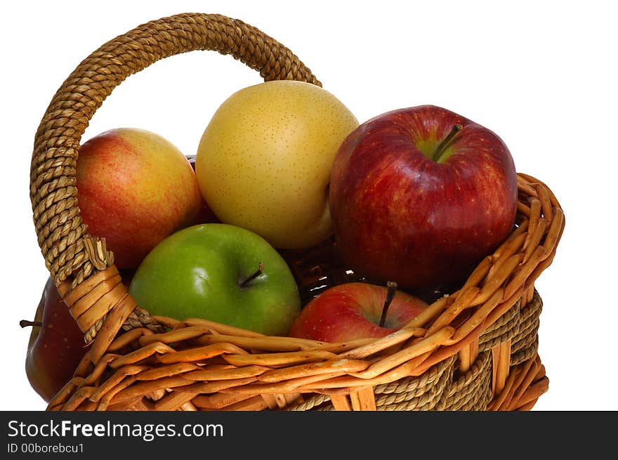 Variety of apples in basket with white background.