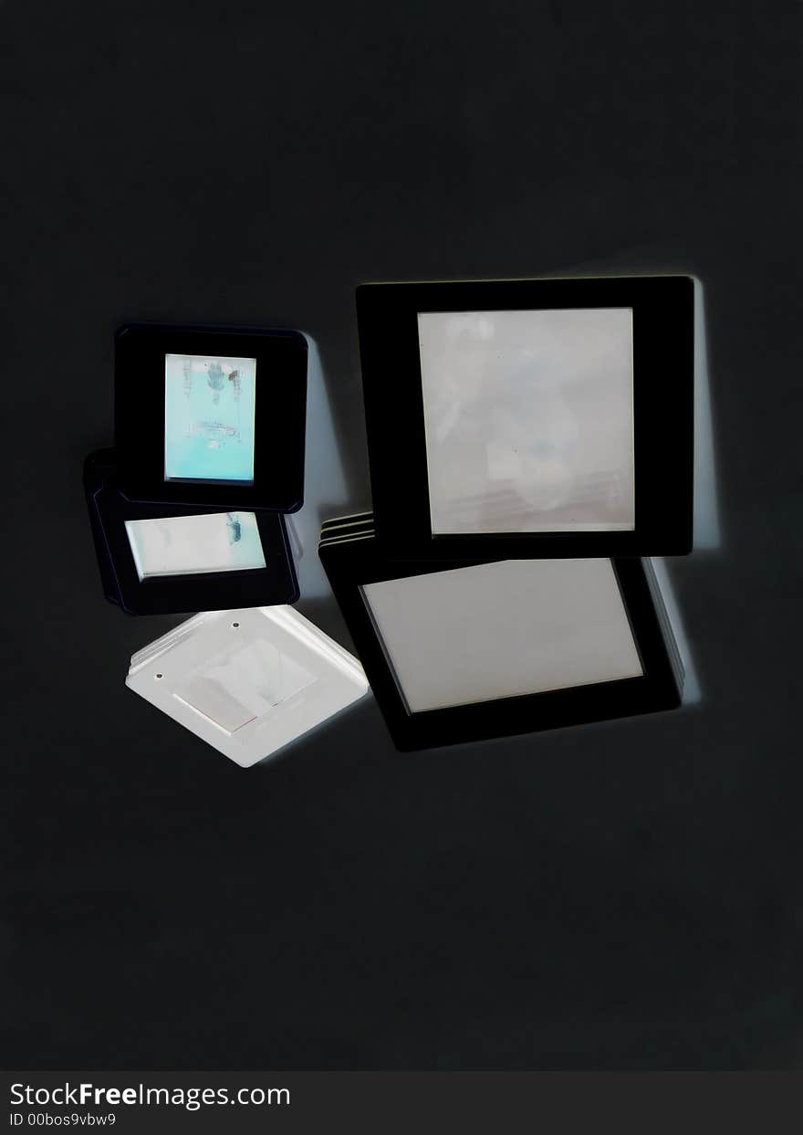 A set of different slides with pictures in over black background.