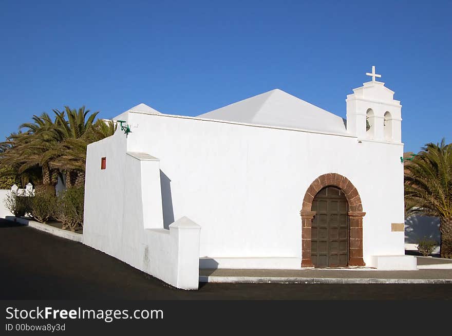 A small white Spanish chapel. A small white Spanish chapel