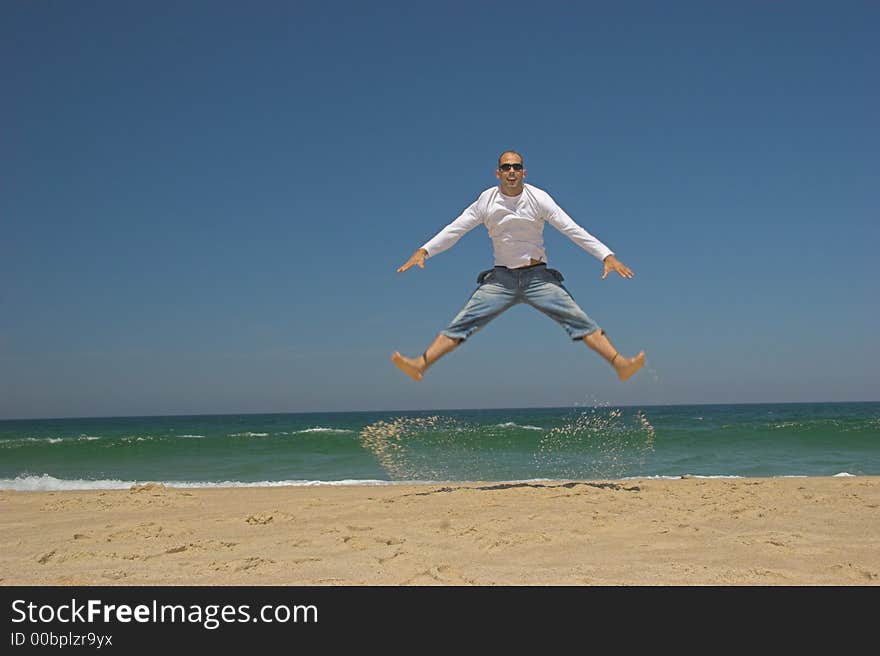 Man jumping on the beach