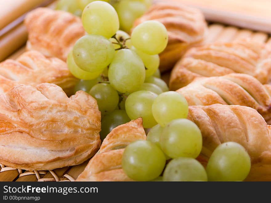 French cookies with grapes background texture.