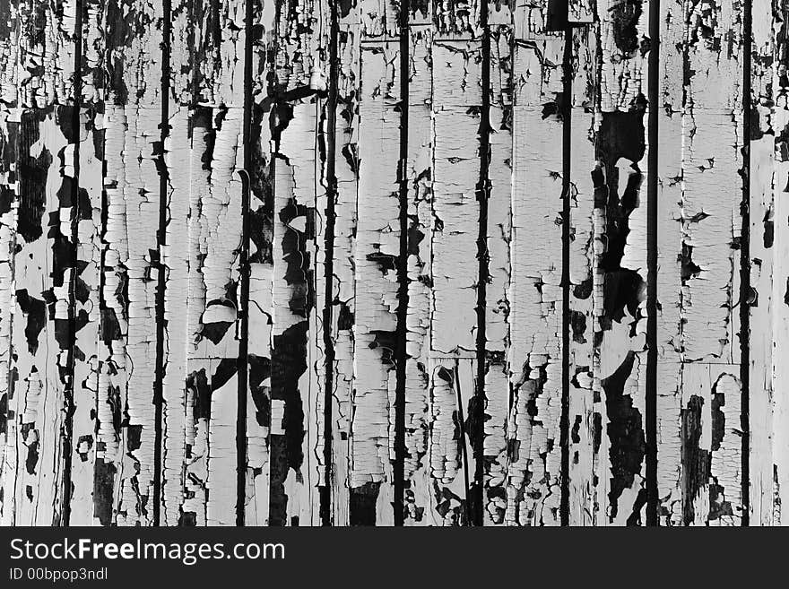 Shot of an old weathered building that has peeling paint.